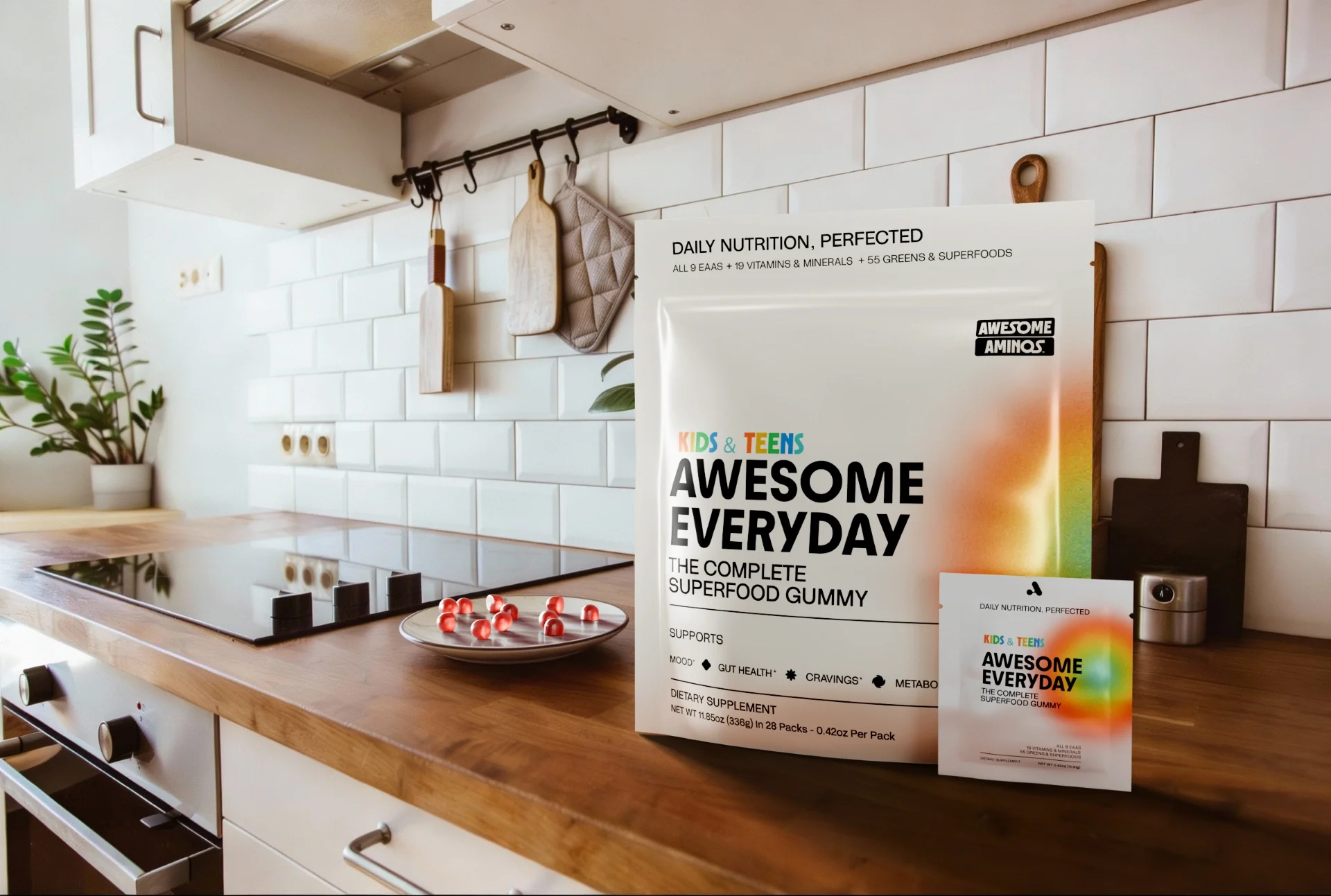Awesome Everyday™ Kids & Teens gummy packaging displayed on a bright kitchen counter.